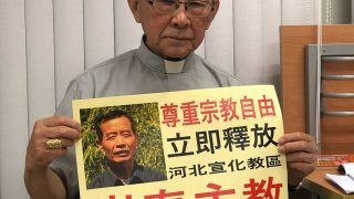 Cardinal Zen with a photo of Bishop Cui Tai