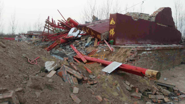 Il tempio Puguang ridotto in un mucchio di rovine