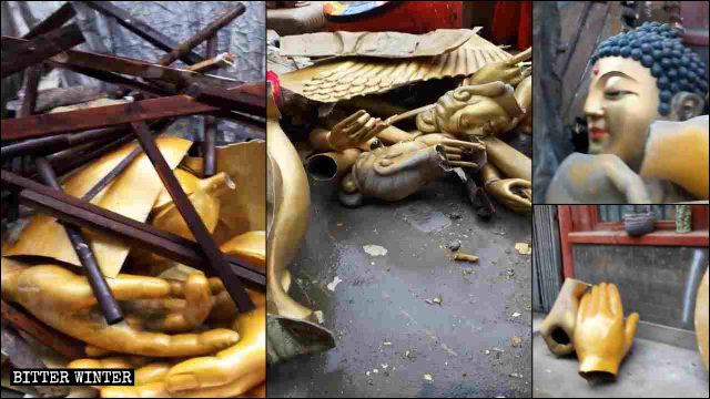 Le statue demolite vengono trascinate via, lasciandosi dietro soltanto detriti